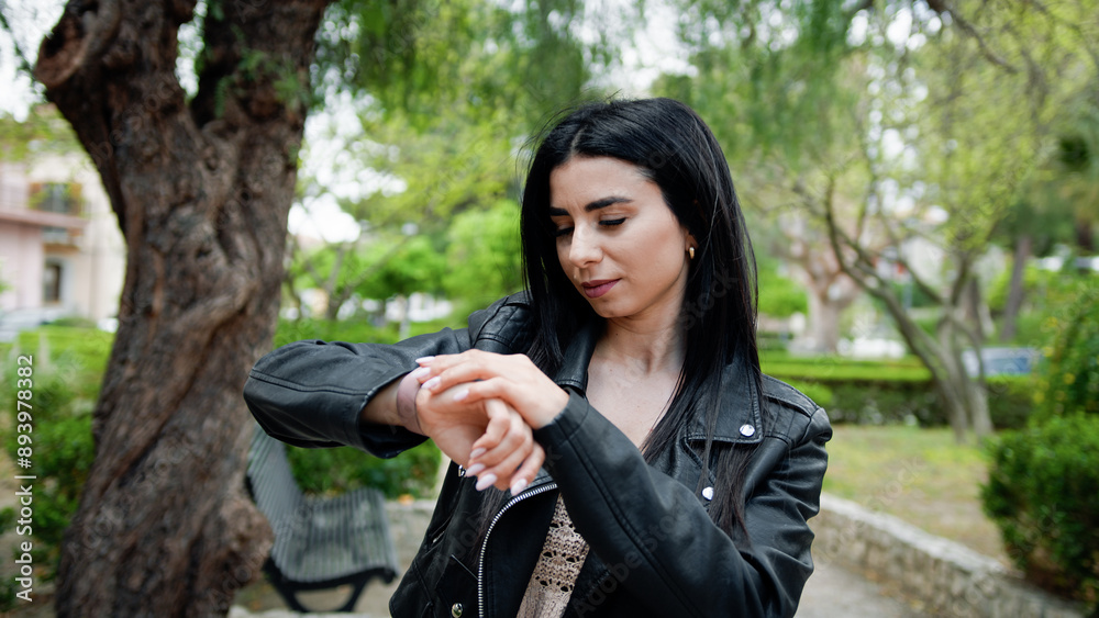 Woman Checking Time With The Watch Woman Checking Time With The Watch