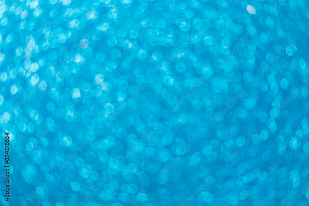 Abstract blurred background. Defocused portrait lens back. Backdrop bokeh. Vivid blue.