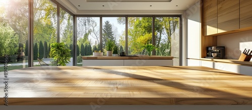 Modern Sunlit Kitchen with Wooden Countertops and Large Windows Overlooking a Green Garden