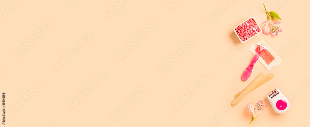 Razor, wax, modern epilator and flowers on beige background Razor, wax, modern epilator and flowers on beige background