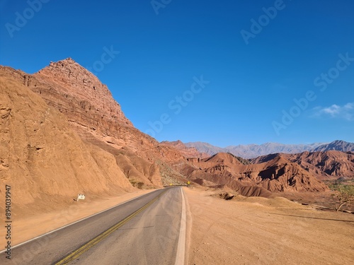 Asphalted highway in the mountainous and desert region of Quebrada de Las Conchas