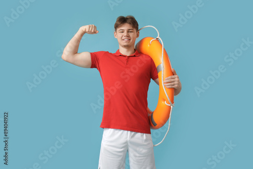 Male lifeguard with ring bu...
