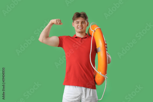 Male lifeguard with ring bu...