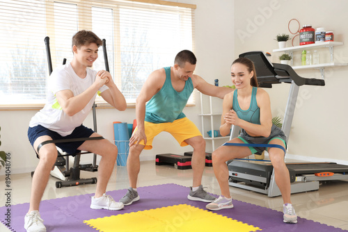 Male coach training young p...