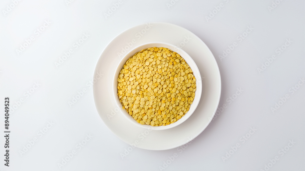 Golden couscous served in a white bowl, a light and fluffy Mediterranean side dish Golden couscous served in a white bowl, a light and fluffy Mediterranean side dish