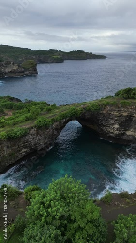 Aerial video of a broken beach, in Bali, Indonesia photo