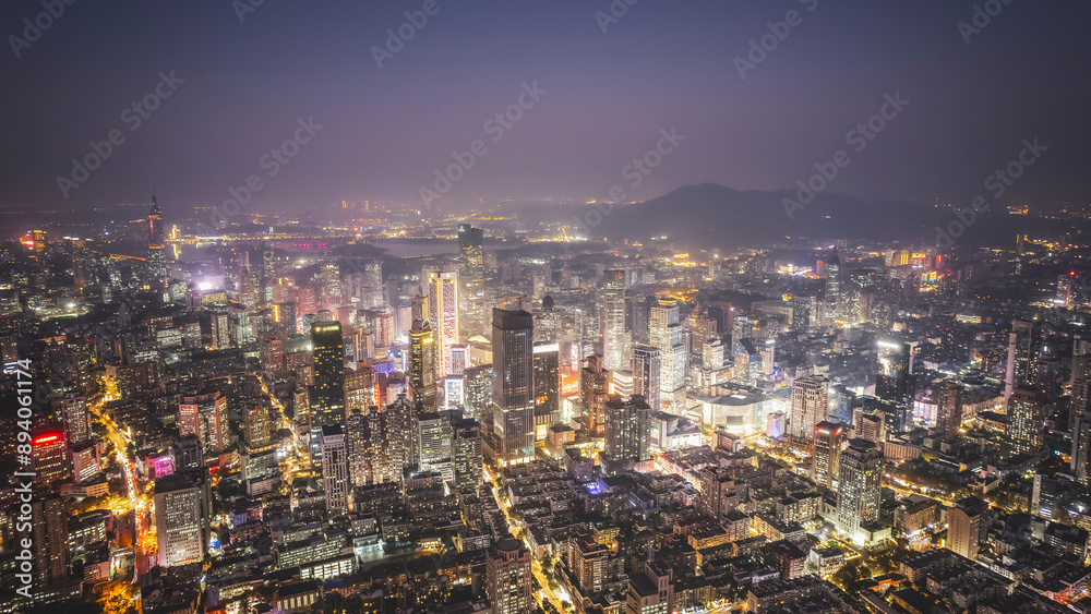 Stunning Aerial View of a Vibrant Metropolitan City at Night Stunning Aerial View of a Vibrant Metropolitan City at Night