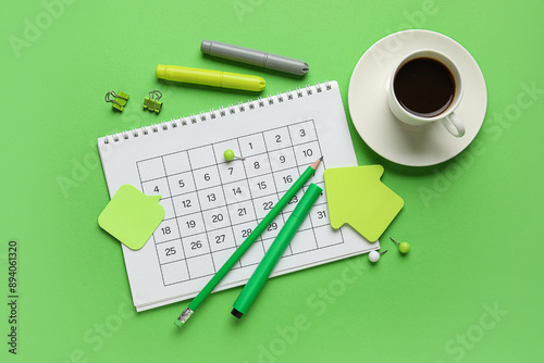 Calendar with cup of coffee...