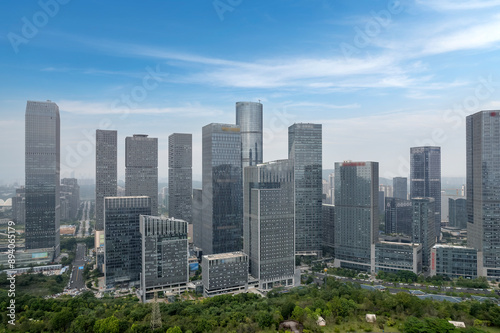 Aerial View of Modern Urban Skyline with Lush Greenery