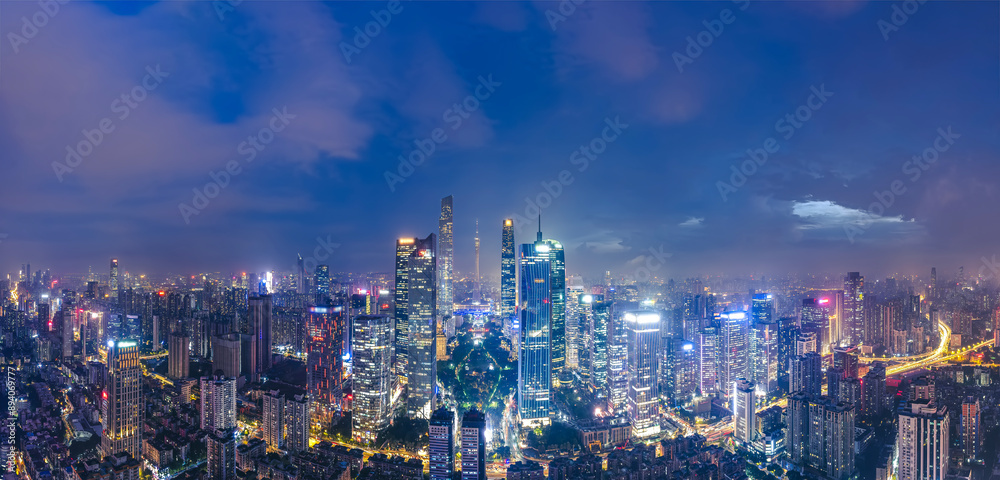Fototapeta premium Breathtaking Cityscape Panorama at Night with Vibrant Lights
