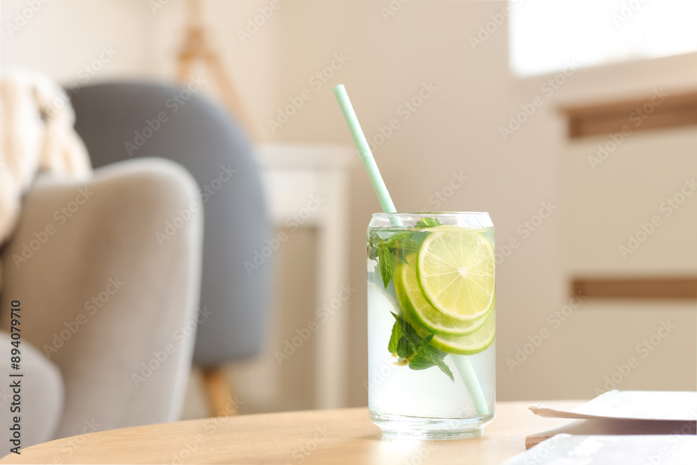 Glass of tasty mojito on table at home Glass of tasty mojito on table at home