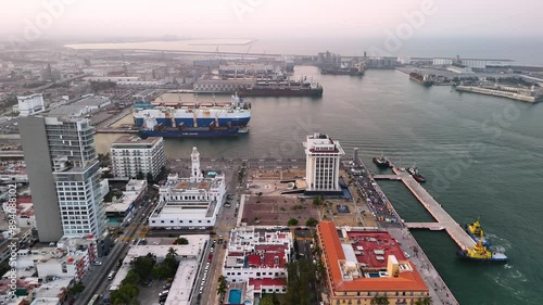 Lateral drone shot of Veracruz port at sunset in mexico photo