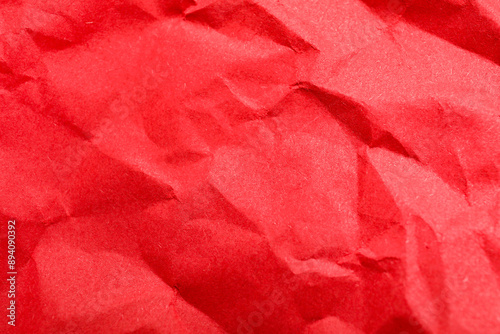 Texture of red crumpled pap...