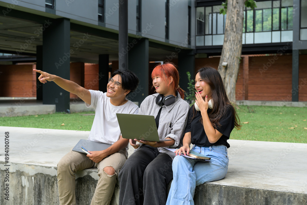 © Parichat - Group of Happy Students Studying Together Outdoors on Campus with Laptops and Notebooks © Parichat - Group of Happy Students Studying Together Outdoors on Campus with Laptops and Notebooks