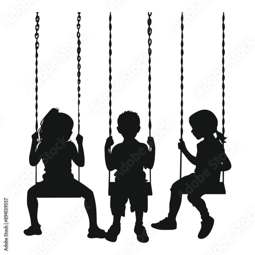 Silhouette of three children swinging on a playground