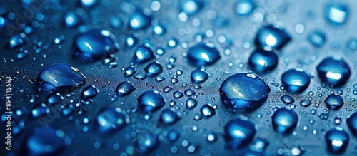 Wallpaper Mural Close-up of Water Droplets on a Blue Surface Torontodigital.ca