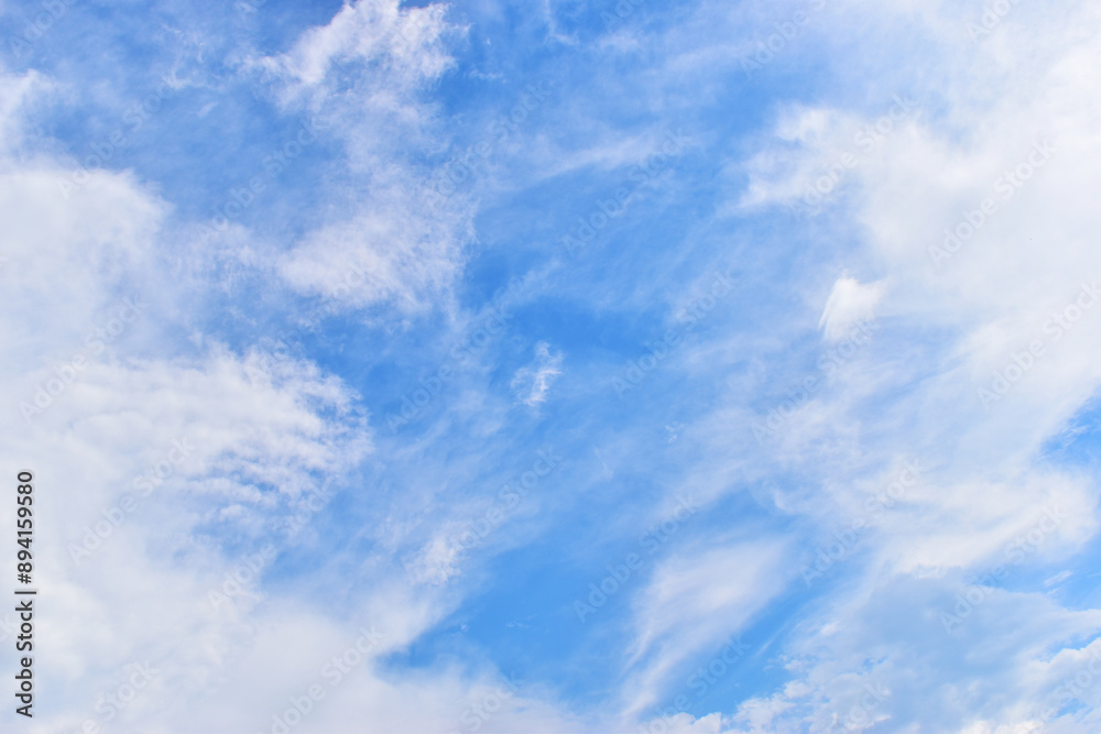 beautiful blue sky and white fluffy group of clouds with sunrise in the morning, natural background beautiful blue sky and white fluffy group of clouds with sunrise in the morning, natural background