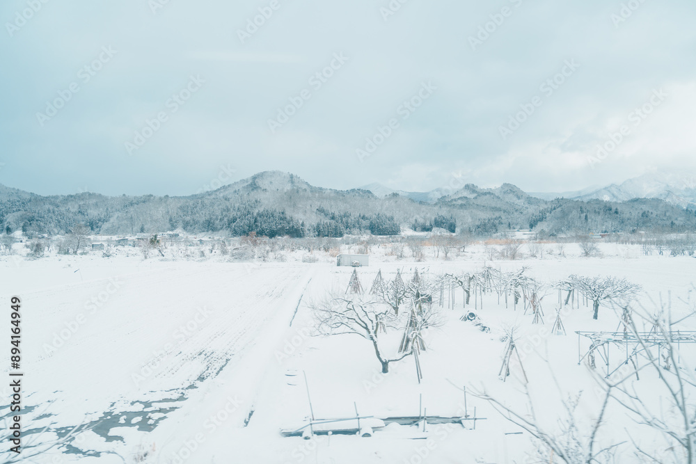 Landscape of mountain with snow in winter day. Photo from train window. Nature background Landscape of mountain with snow in winter day. Photo from train window. Nature background
