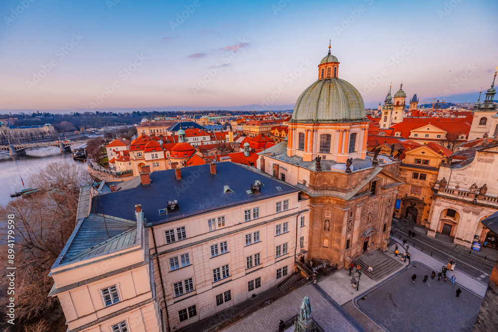 Fototapeta premium View of the city of Prague castle in hradcany and the Vltava river with Charles bridge from Old Town Bridge Tower in Prague, Czech Republic.