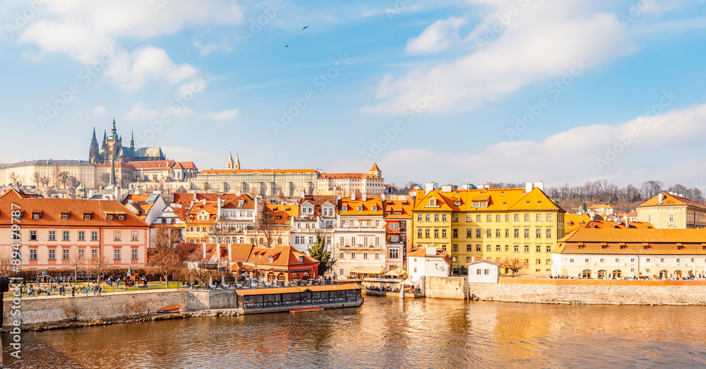 Fototapeta premium View of the city of Prague castle in hradcany and the Vltava river from Charles bridge in Prague, Czech Republic.