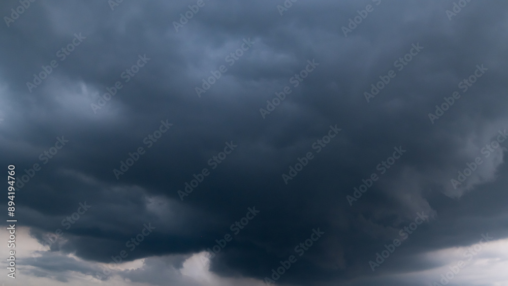 dark storm clouds with background,Dark clouds before a thunder-storm. dark storm clouds with background,Dark clouds before a thunder-storm.