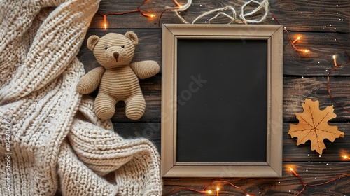 Pregnancy Announcement : Fall Baby with Black Letter Board Mockup featuring Teddy Doll, Fairy Lights, and Fluffy Blanket on the Wooden Floor, Winter Pregnancy with Flat Lay or Top View photo