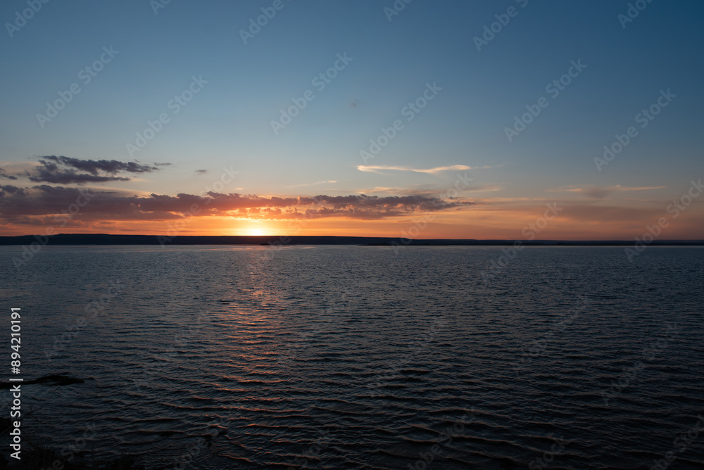 beautiful sunset on the sea view from afar beautiful sunset on the sea view from afar