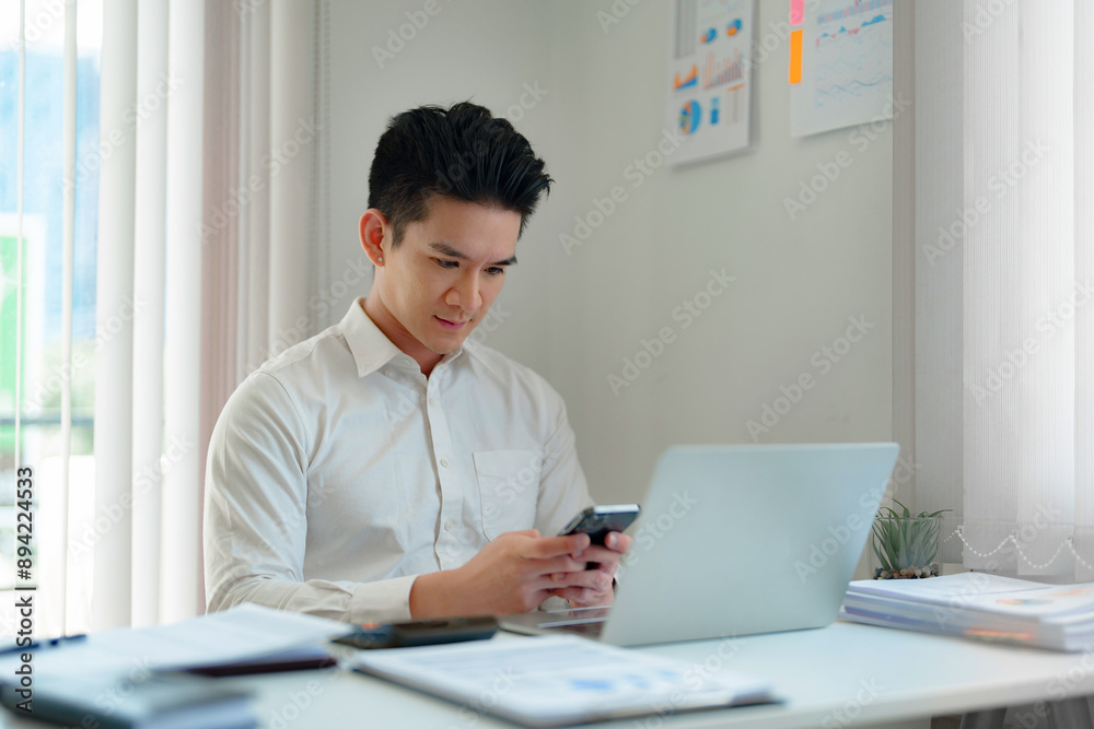 Businessman thoughtful using smartphone browsing internet Businessman thoughtful using smartphone browsing internet