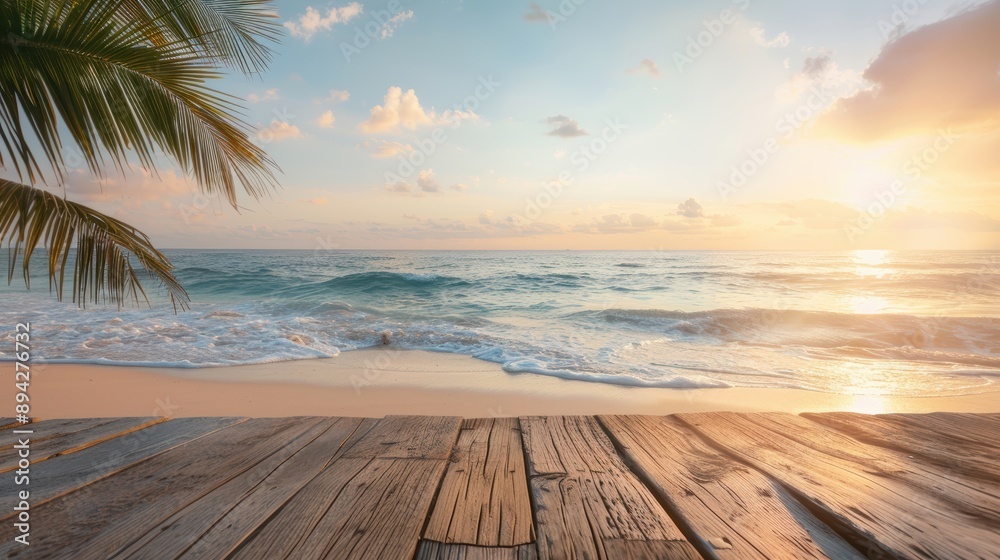 Fototapeta premium Sunset over a tropical beach, with a wooden table, palm trees, and waves, ideal for vacation and relaxation themes