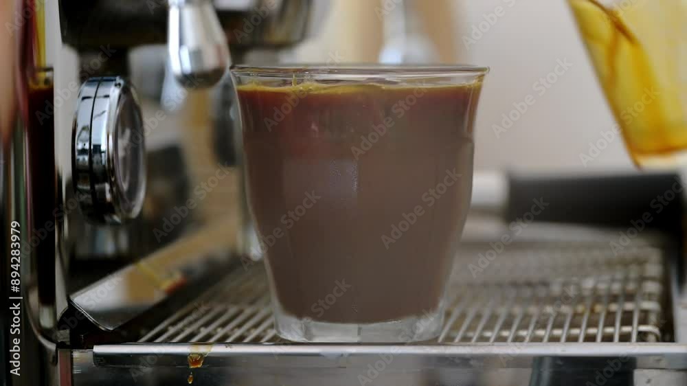Pouring espresso Coffee over Ice. Pouring espresso Coffee over Ice.