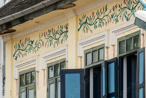 decoration on a wall of an old house in Luang Prabang, Laos