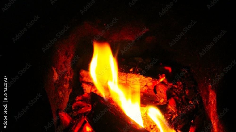 photograph of close up bonfire using firewoods in orange-red photograph of close up bonfire using firewoods in orange-red