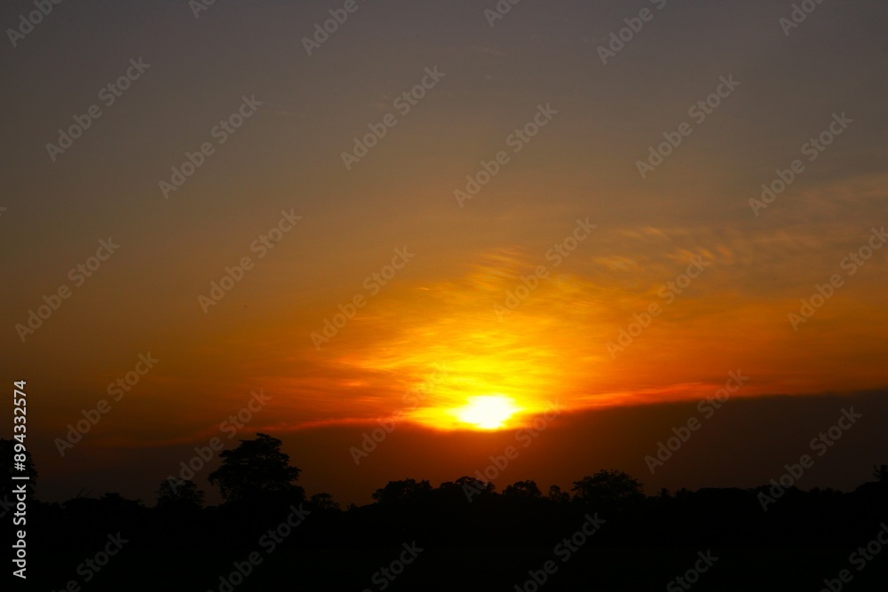 Sunset Sky Clouds in the evening with Red, Orange, Yellow and purple sunlight on Golden hour after sundown, Romantic sky in summer on Dusk Twilight. heart sky. Sunset Sky Clouds in the evening with Red, Orange, Yellow and purple sunlight on Golden hour after sundown, Romantic sky in summer on Dusk Twilight. heart sky.