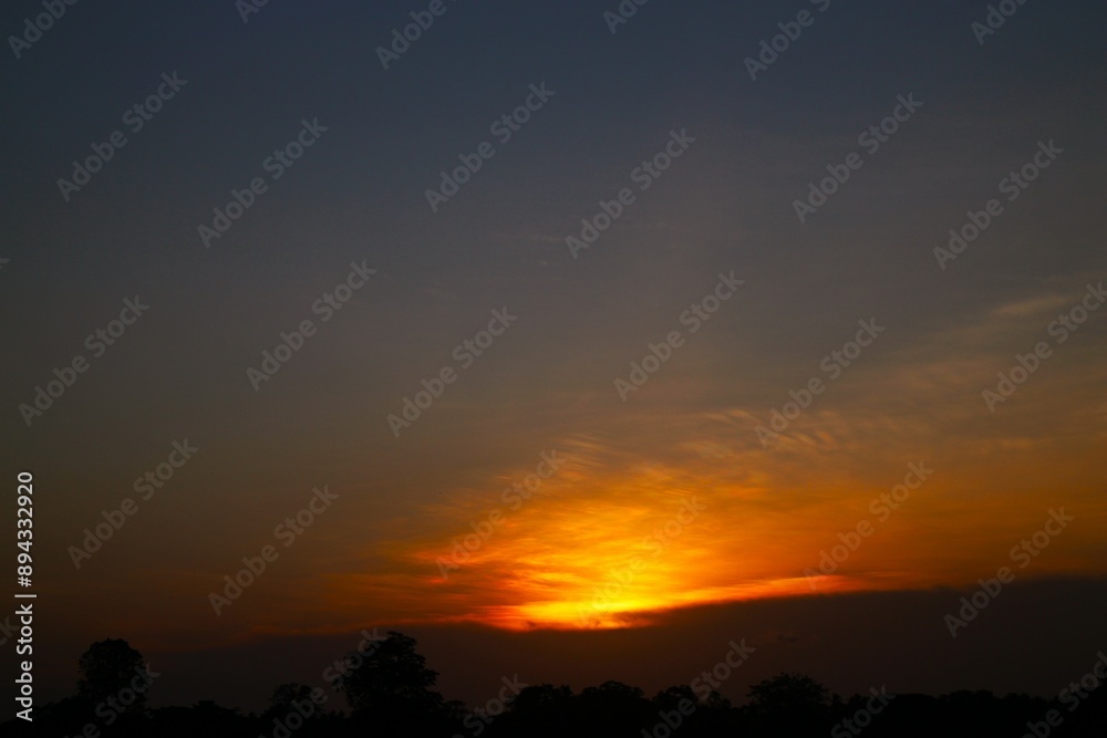 Sunset Sky Clouds in the evening with Red, Orange, Yellow and purple sunlight on Golden hour after sundown, Romantic sky in summer on Dusk Twilight. heart sky. Sunset Sky Clouds in the evening with Red, Orange, Yellow and purple sunlight on Golden hour after sundown, Romantic sky in summer on Dusk Twilight. heart sky.
