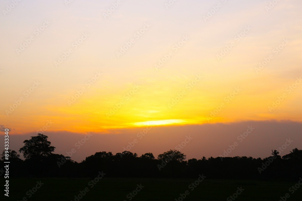 Sunset Sky cloud in the Morning Sunrise with Orange, Yellow Golden Hour Sunrise on Summer season, Horizon Dusk Sky Dramatic Nature Background Sunset Sky cloud in the Morning Sunrise with Orange, Yellow Golden Hour Sunrise on Summer season, Horizon Dusk Sky Dramatic Nature Background