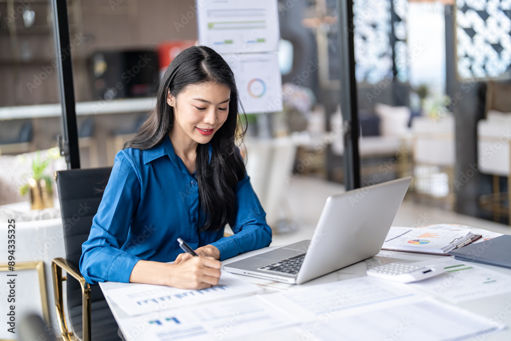 Beautiful Business Woman working by using laptop computer Hands typing on keyboard. Professional investor working new start up project. business planning in office. Technology business