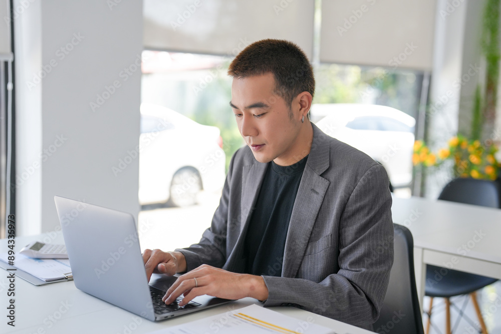 Business man working using laptop computer Hands typing keyboard. Professional investor working start up project. business planning in office. Technology business Business man working using laptop computer Hands typing keyboard. Professional investor working start up project. business planning in office. Technology business