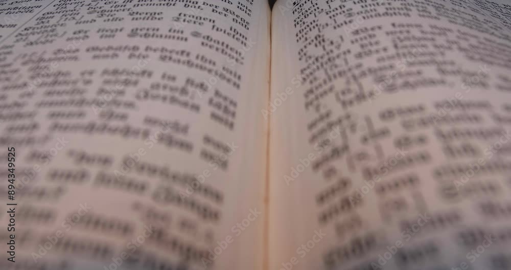 Old Open Book With Old Script. Blur The Ancient Scriptures. Old Open Book With Old Script. Blur The Ancient Scriptures.