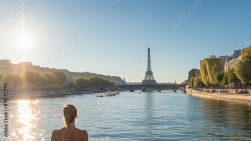 Swimmer at eiffel tower in france during 2024 sport games, international athleticism display photo