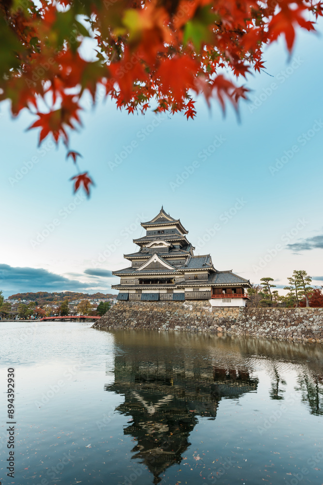 Naklejka premium Matsumoto Castle or Crow Castle in Autumn, is one of Japanese premier historic castles in easthern Honshu. Landmark and popular for tourists attraction in Matsumoto city, Nagano Prefecture, Japan