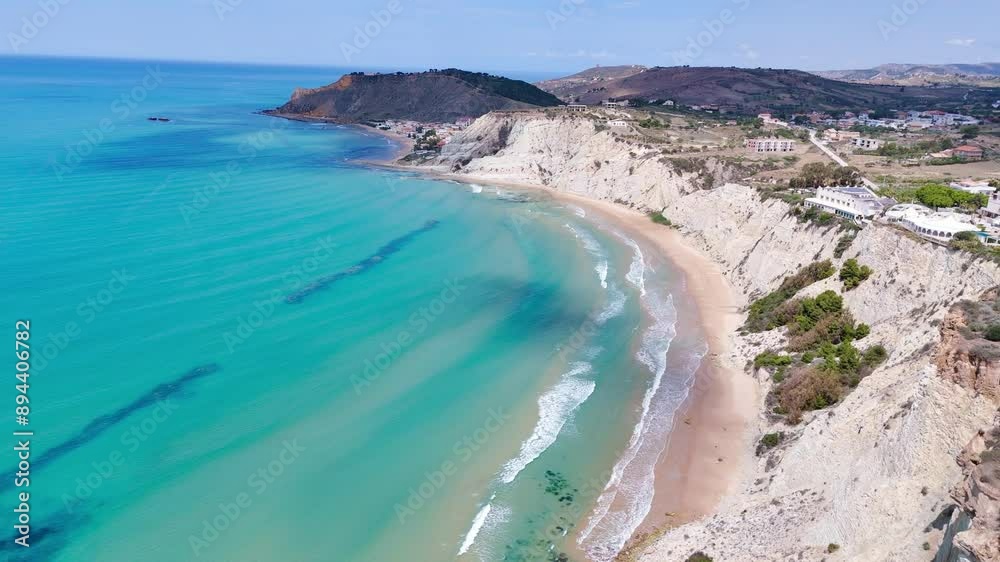 Soaring over Sicily's picturesque coastal scenery, where mountains meet the sea Soaring over Sicily's picturesque coastal scenery, where mountains meet the sea