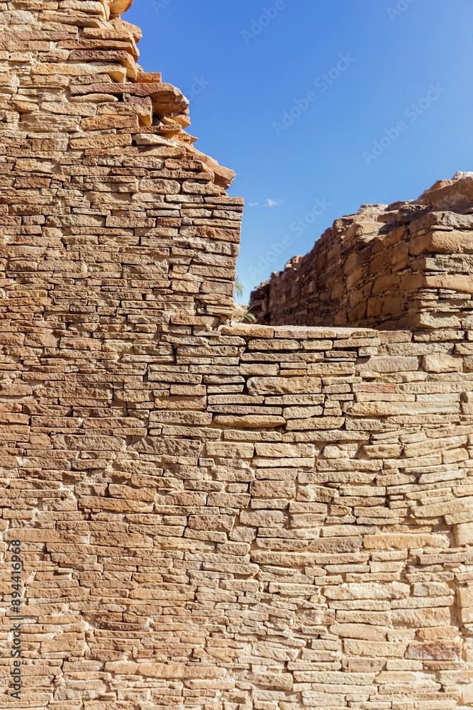 Network of brick ruins in the desert offering a glimpse into ancestral Puebloan life. Chaco Canyon, New Mexico, United States of America. Network of brick ruins in the desert offering a glimpse into ancestral Puebloan life. Chaco Canyon, New Mexico, United States of America.