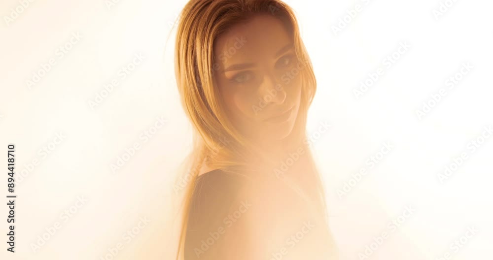 Portrait of a beautiful young Caucasian woman in a black shirt with on a white background. Portrait of a beautiful young Caucasian woman in a black shirt with on a white background.