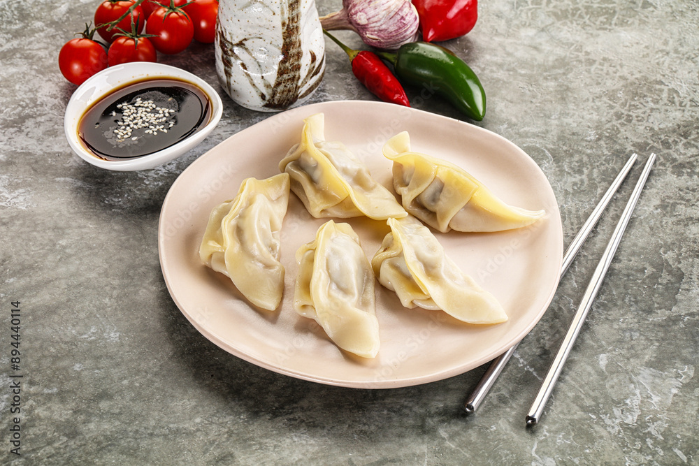 Japanese cuisine - dumplings gyoza with sauce Japanese cuisine - dumplings gyoza with sauce