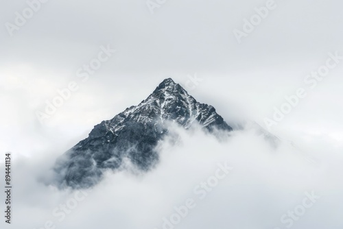 Snow-Capped Mountain Above Clouds