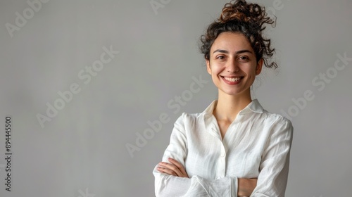 Smiling Woman in a White Shirt