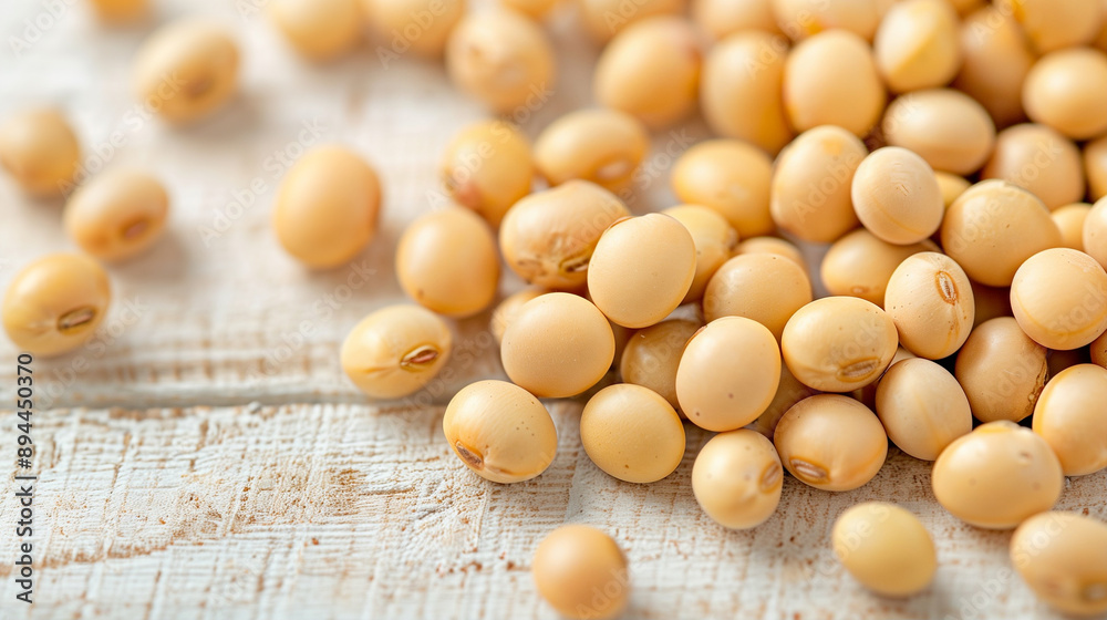 Soybeans on a rustic wooden table showcasing their natural texture and color. Healthy food option for various culinary uses emphasizing freshness and quality Soybeans on a rustic wooden table showcasing their natural texture and color. Healthy food option for various culinary uses emphasizing freshness and quality