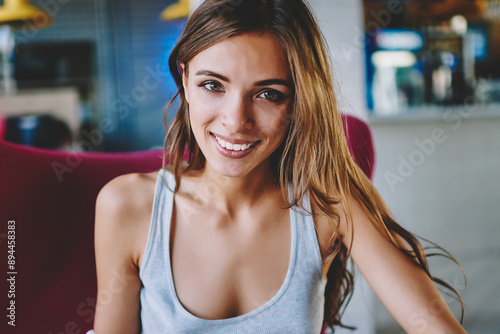 Portrait of successful student doing homework and making notes in notepad reading information from internet websites on smartphone device.Cheerful young woman with telephone in hands writing essay Free Download Portrait of successful student doing homework and making notes in notepad reading information from internet websites on smartphone device.Cheerful young woman with telephone in hands writing essay - GFXLoad