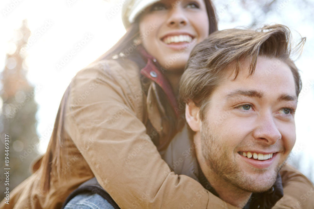 Fototapeta premium Relationship, couple and smile in forest with piggyback for bonding, support and trust in Germany. Love, people and happy in outdoor or woods for holiday, sightseeing and adventure in winter