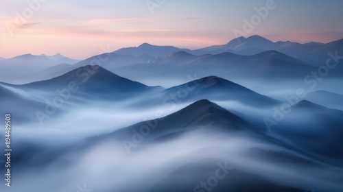 Wallpaper Mural A captivating view of a mountain range covered in mist and fog during dawn, with soft light gently highlighting the natural contours and creating an ethereal atmosphere. Torontodigital.ca